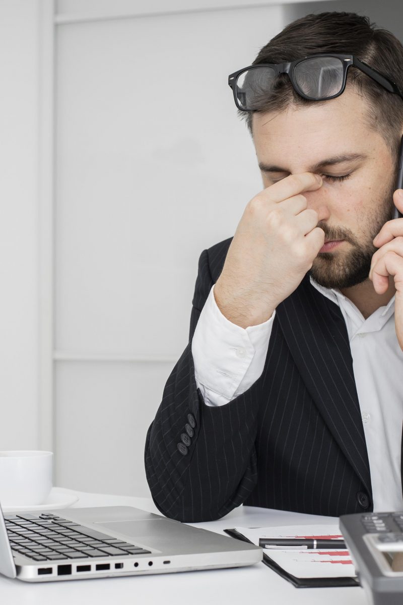 businessman-having-hard-day-office