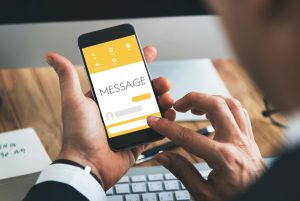 Hands on a mobile texting