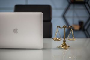 laptop next to a scale